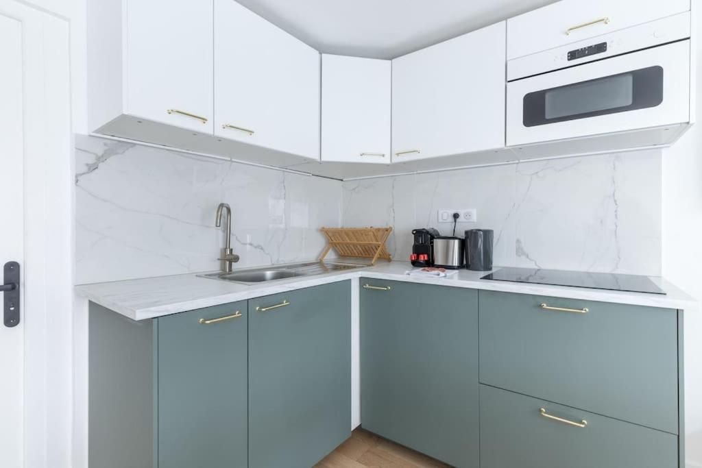 Grands Boulevards 42 Appartement Cosy 1 Br-4P Parigi Esterno foto